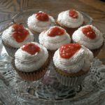 image of strawberry shortcake cupcakes on a cake plate