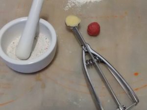 image of porcelain mortar and pestle, and scoop.