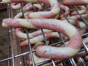 image of candy cane cookie sprinkled with sugar mixture